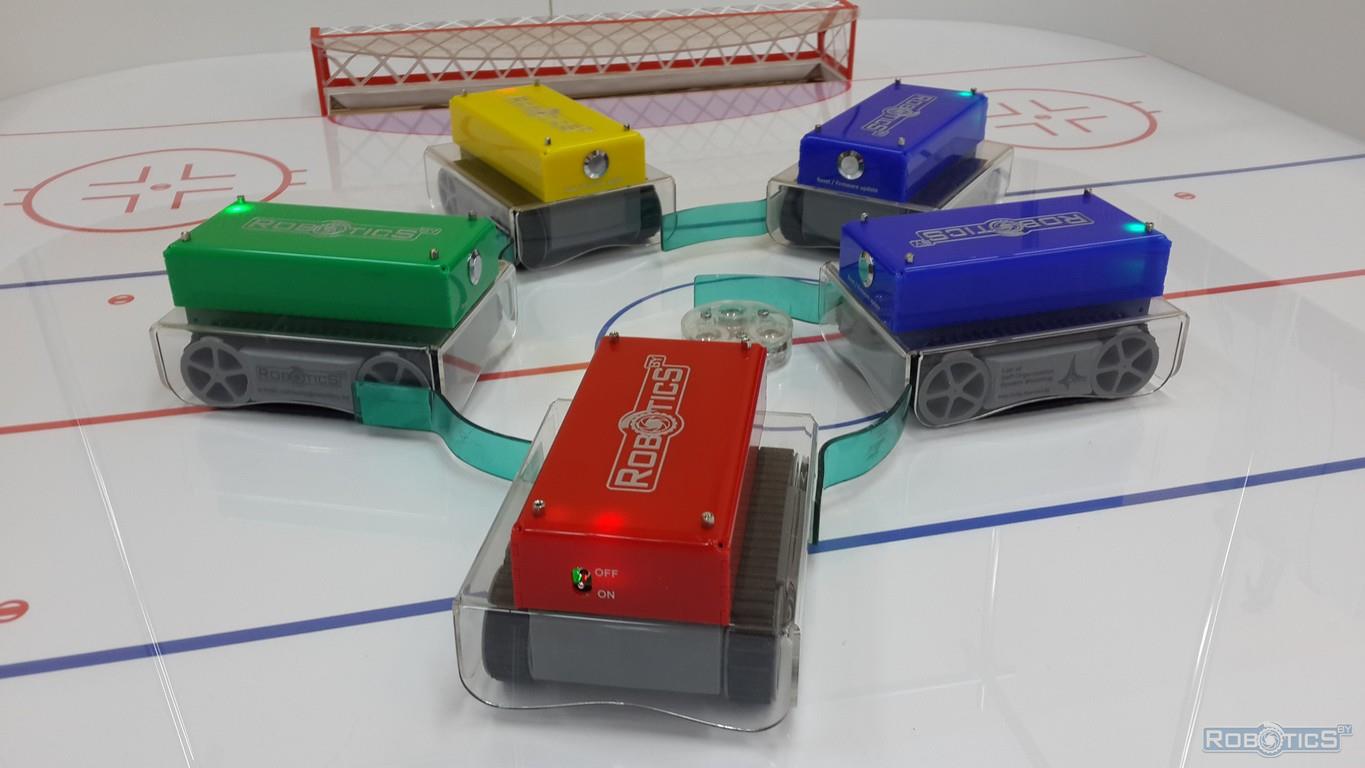 A group game of mobile robots in robo-hockey arena in Minsk.