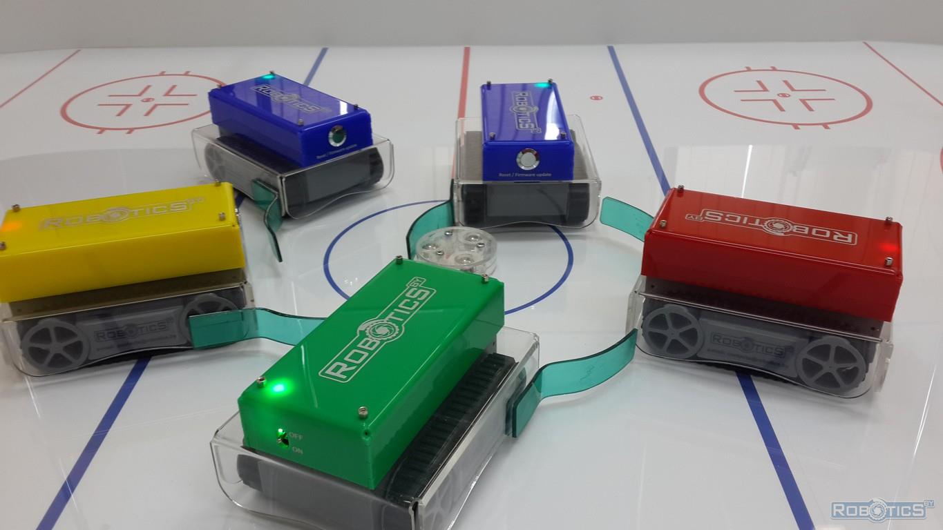 A group game of mobile robots in robo-hockey arena in Minsk.
