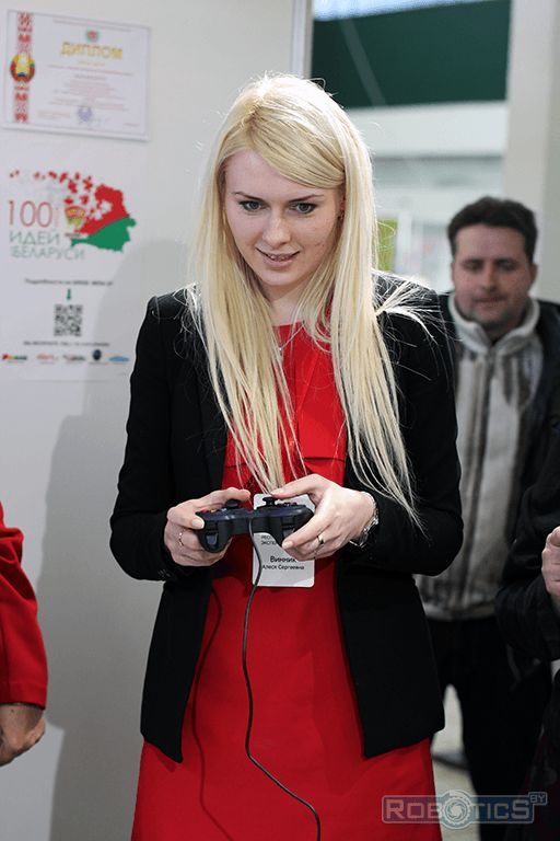 Project coordinator «100 ideas for Belarus» Alesya Vinnik plays «Hockey robots».