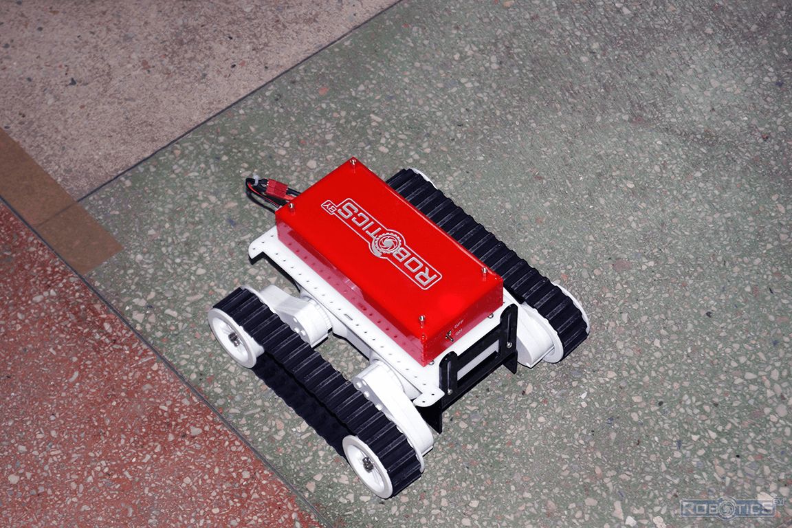 Дистанционно управляемый гусеничный робот сектора робототехники.